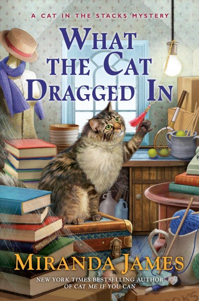 What the cat dragged in / Miranda James.